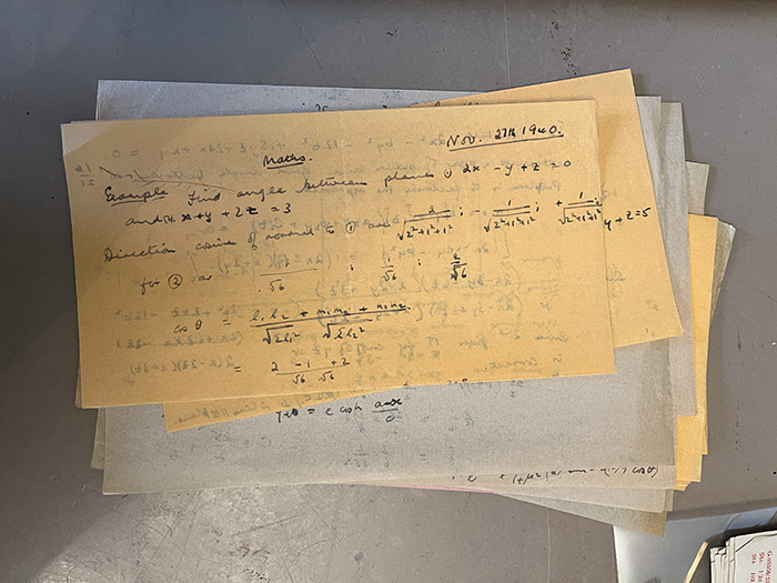 A pile of handwritten papers
