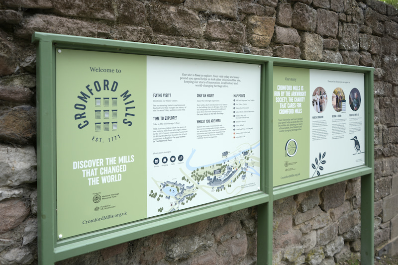Example of brand acknowledgement on external signage at Cromford Mills showing use of our logo and funded by UK government logo.