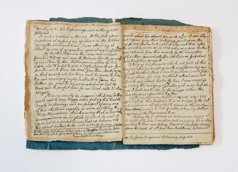Close up view of chapter 1 pages 24-25 of Caroline Herschel's memoir manuscript. Written in black ink on yellowing pages.