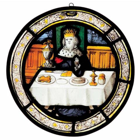 Stained glass roundel depicting the King with plenty of food at the table, representing December Stained glass roundel depicting the King with plenty of food at the table, representing December